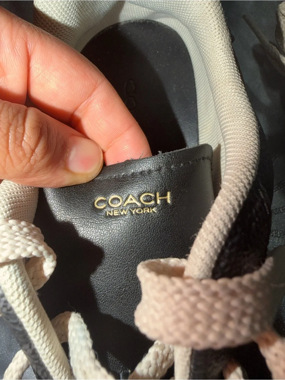 Coach Black Leather Low-Top Sneakers with Cream Soles and Laces